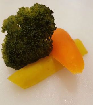 Yes, these are broccoli and rainbow carrots, cooked and tender.